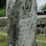 A weather headstone