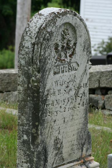 A weather headstone