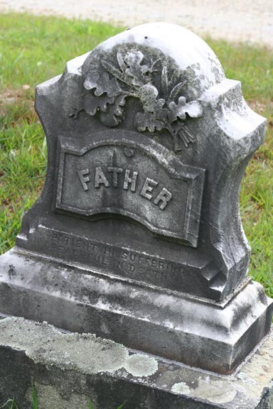‘FATHER’ headstone adorned with oak leaves