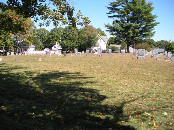 View from the street shows most graves set in the back